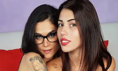 Brunette Power Chiara and Petra Lay Down in a Bed in Black Nylons